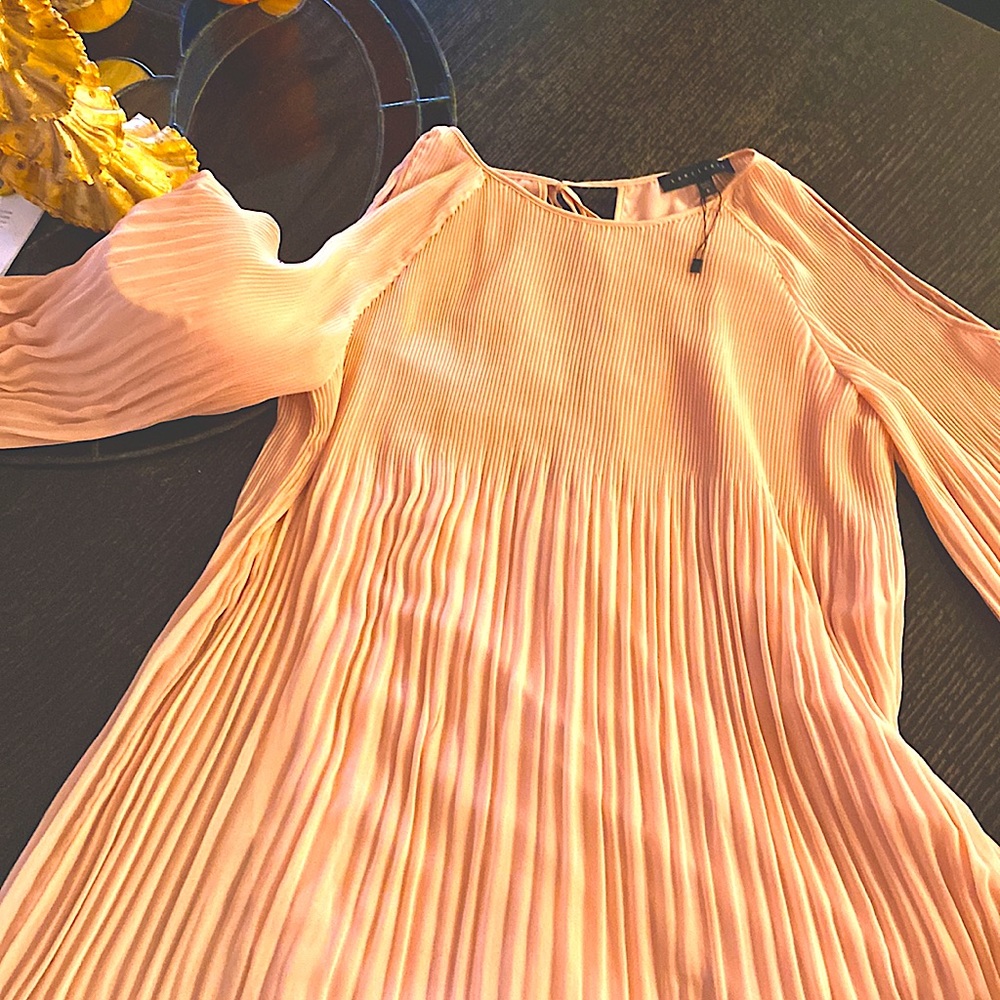 Vestido elegante,a buen precio,nuevo verlo es comprarlo.